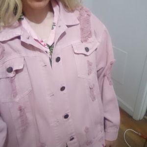 Pale pink destroyed denim jacket